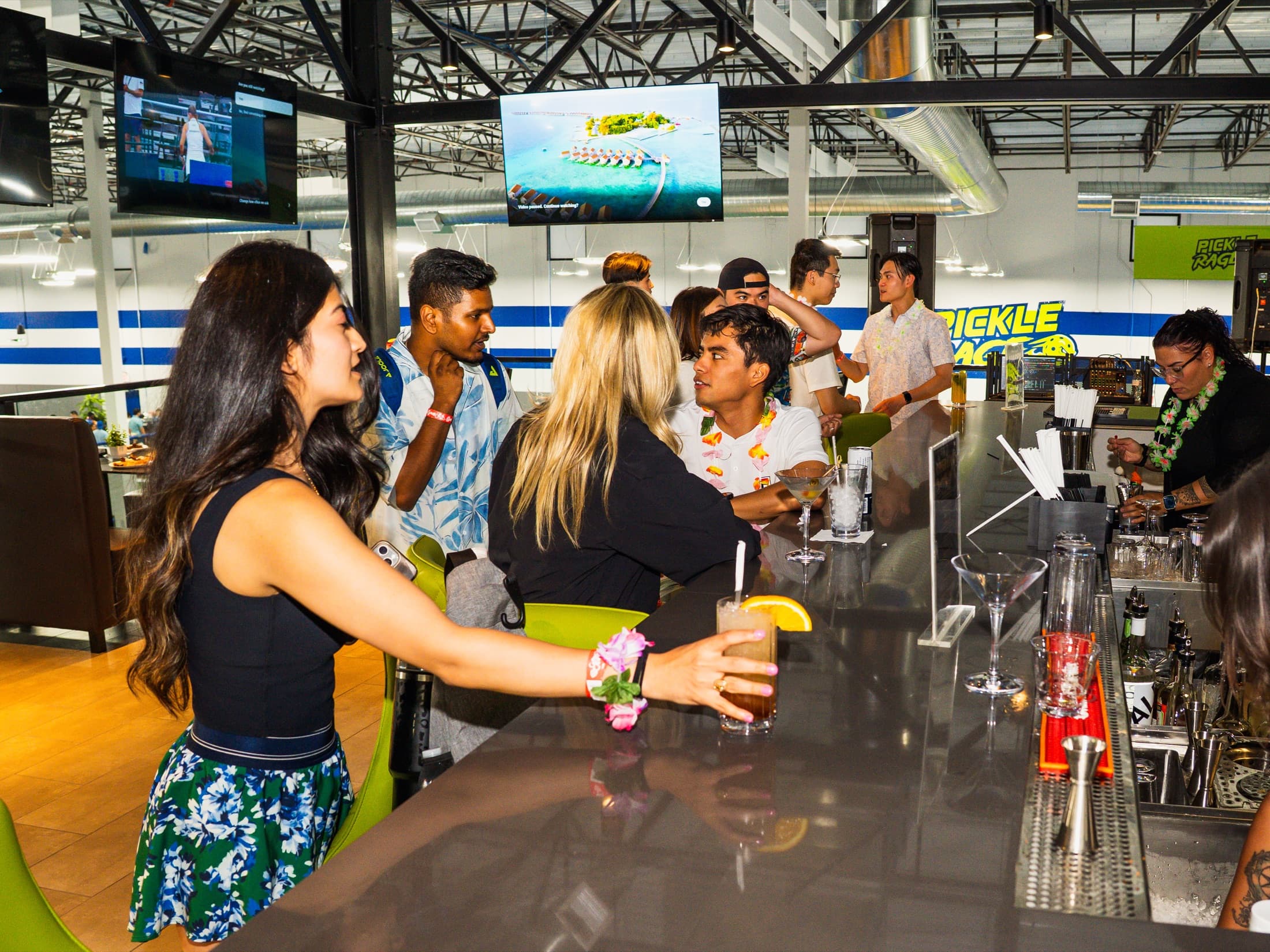 Guests enjoying drinks at The Upper Court bar