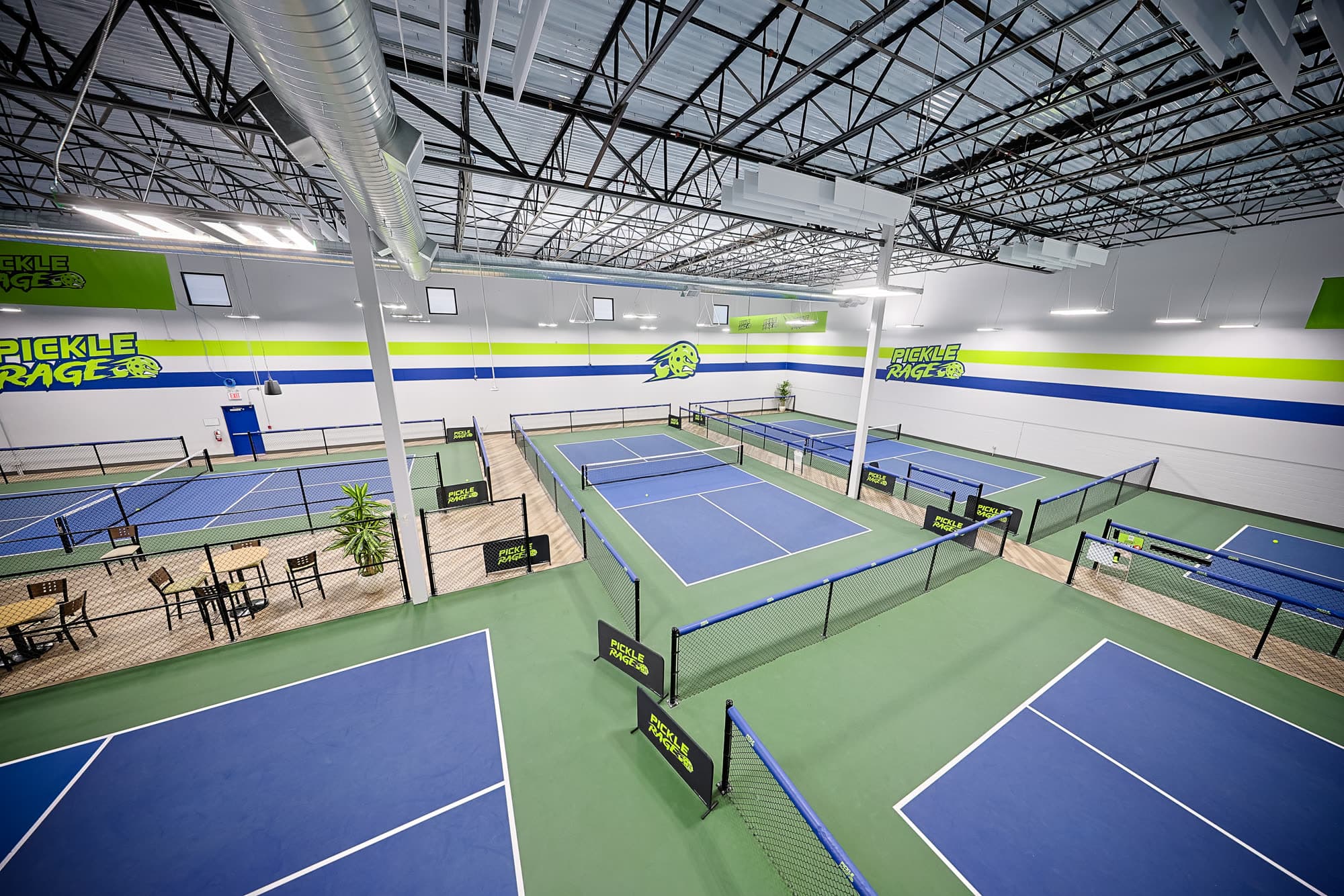 Indoor pickleball courts below The Upper Court